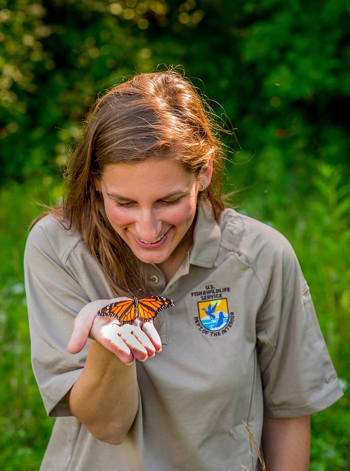 Service employee with Monarch butterfly-1