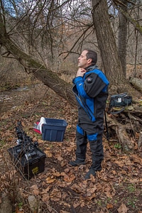 Photographer suits up for a dive