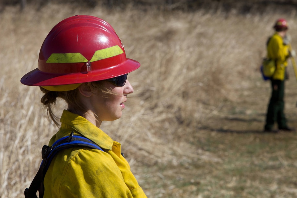 Firefighter watching  burn
