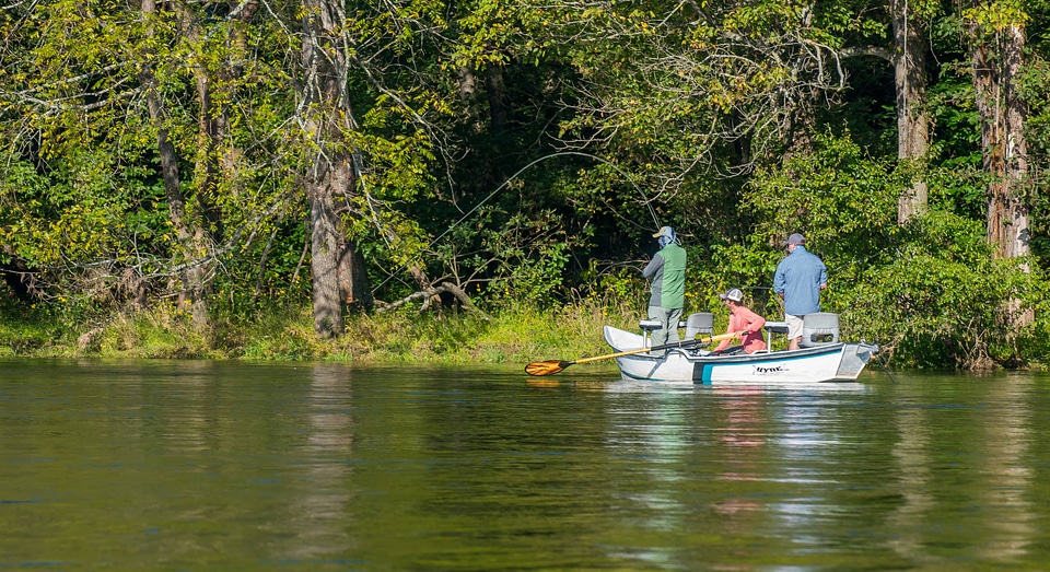 Group fly fishing from drift boat on White River-1