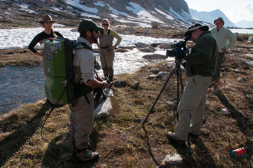 Videographer interviews biologist