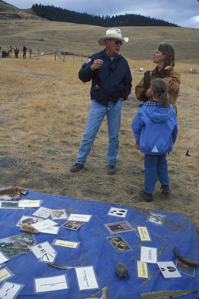 Volunteer Helping Visitors