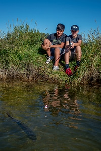Two boys fishing for small mouth bass-1