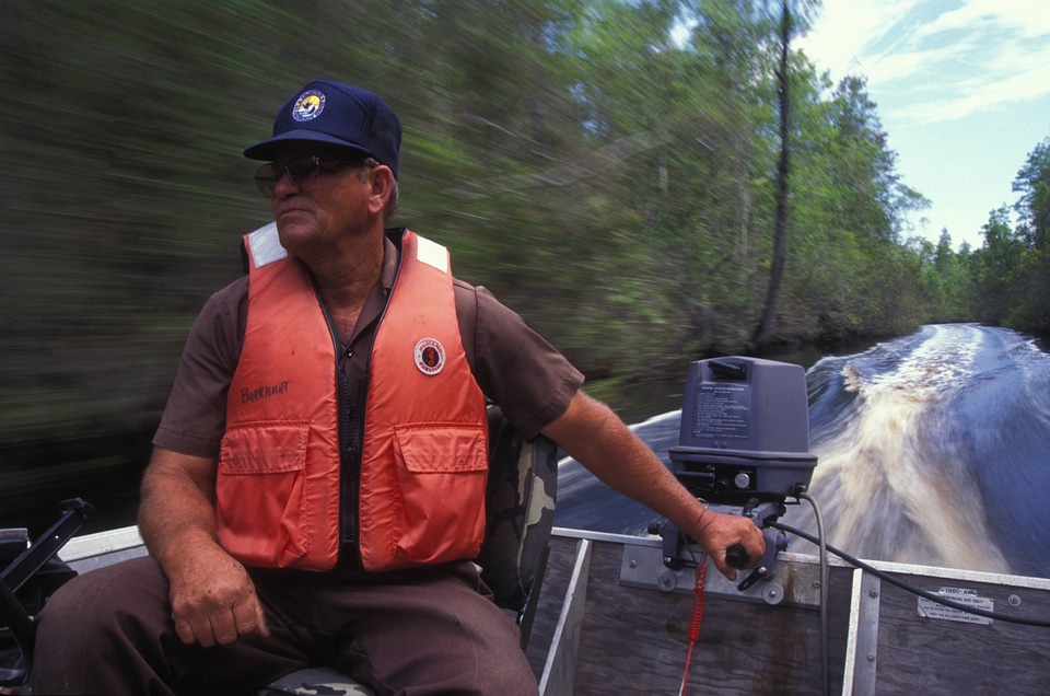 FWS volunteer drives boat