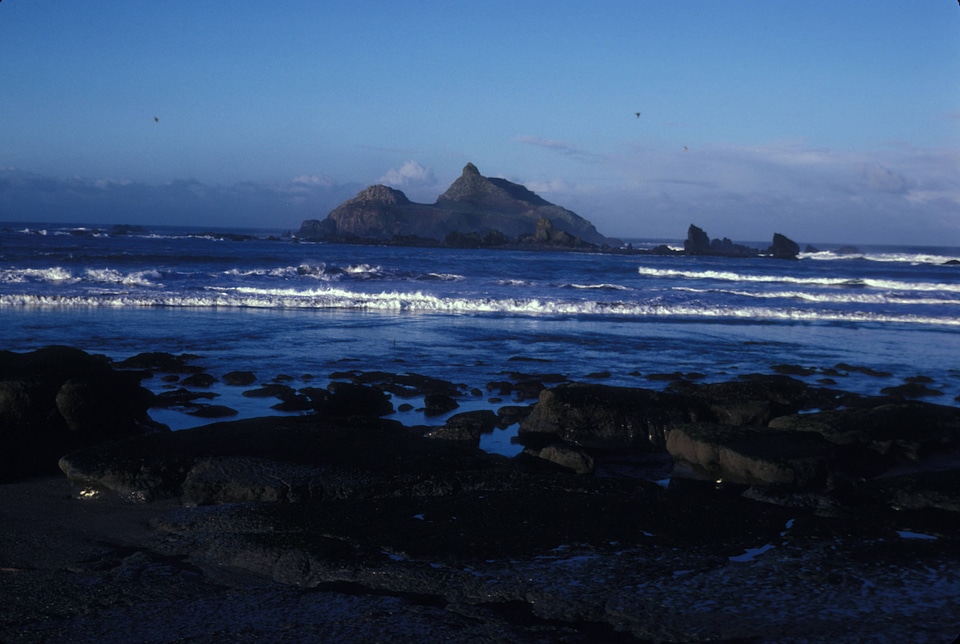 View of Castle Rock National Wildlife Refuge from a mainland California beach