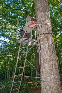 NCTC land management specialist inspecting deer stand for safety-1