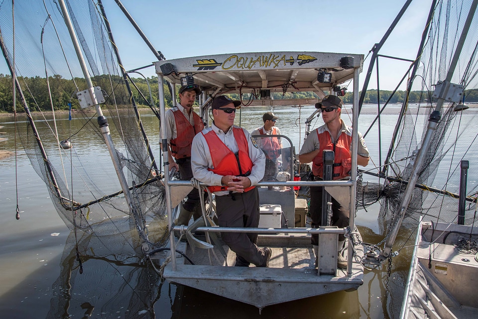 Fisheries crew of the US Fish and Wildlife boat, The Magna Carpa, on Missouri River