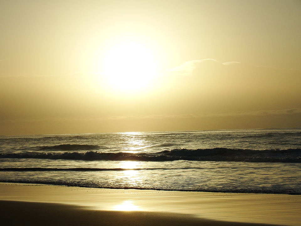 Waves sunrise ocean