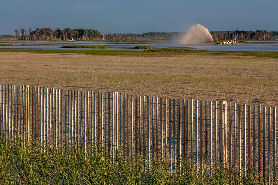Marsh restoration with dredge boat
