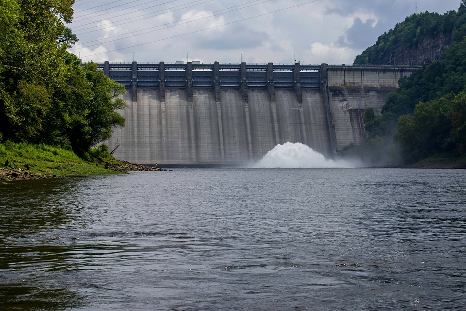 Wolf Creek Dam with sluice gates open, oxygenating water