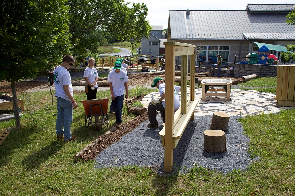 Youth Conservation Corps crew gardening at the Outdoor Nature Explore Classroom