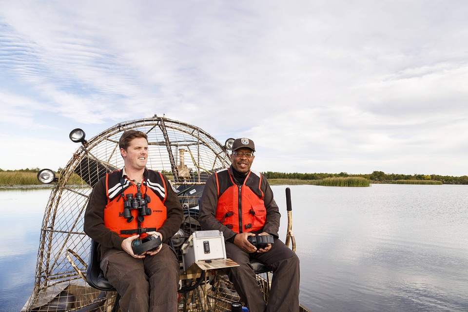 Employees operate an airboat at Bayou Sauvage NWR-2