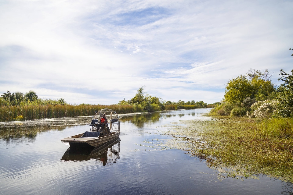 Employees operate an airboat at Bayou Sauvage NWR-1