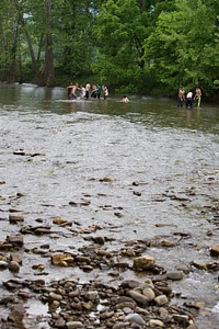 Students play in the water