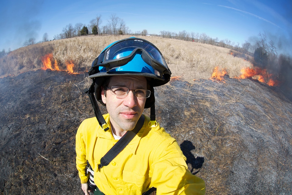 Service employee monitoring prescribed burn-1