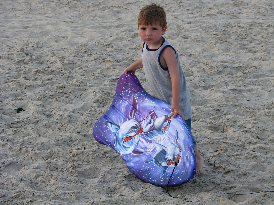 Young boy and his boogie board