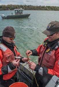 USFWS Fisheries crew baiting lines for lake sturgeon-1