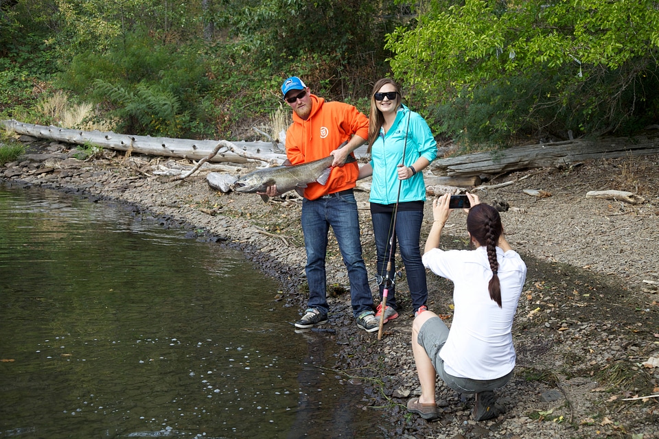 Photographer captures anglers with their fresh catch