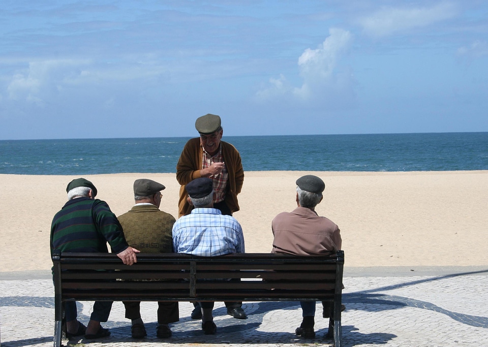 Old men group of people seaside