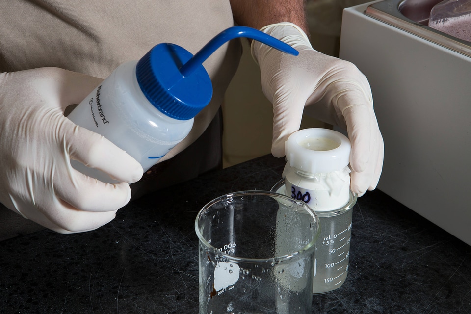 FWS biologist propagates freshwater mussels in a labratory-2