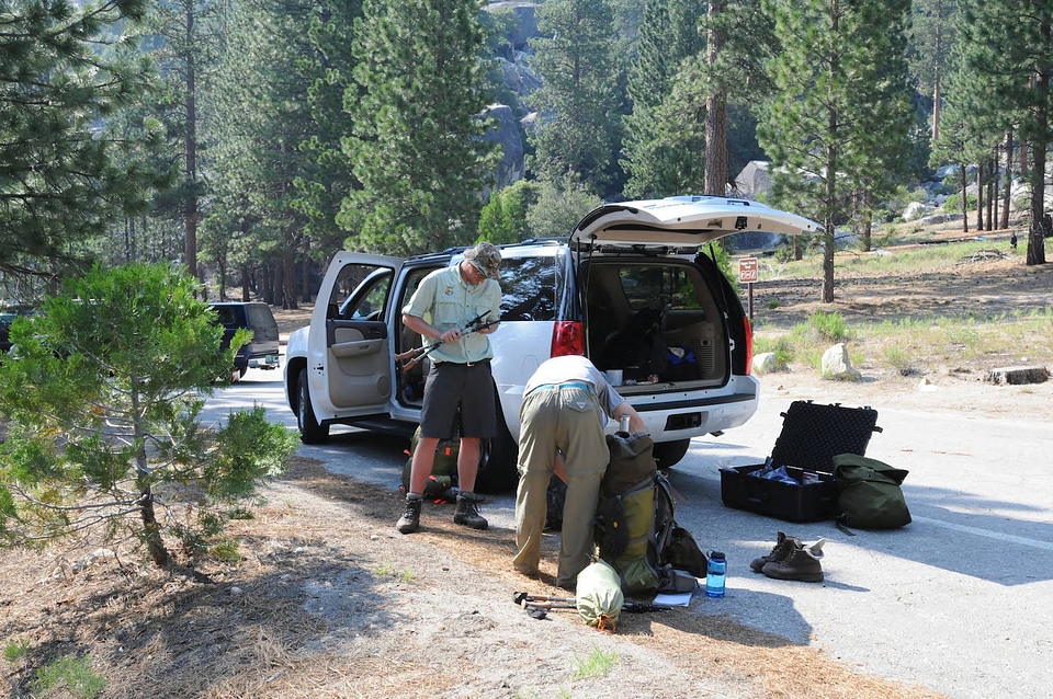 Checking gear for hike