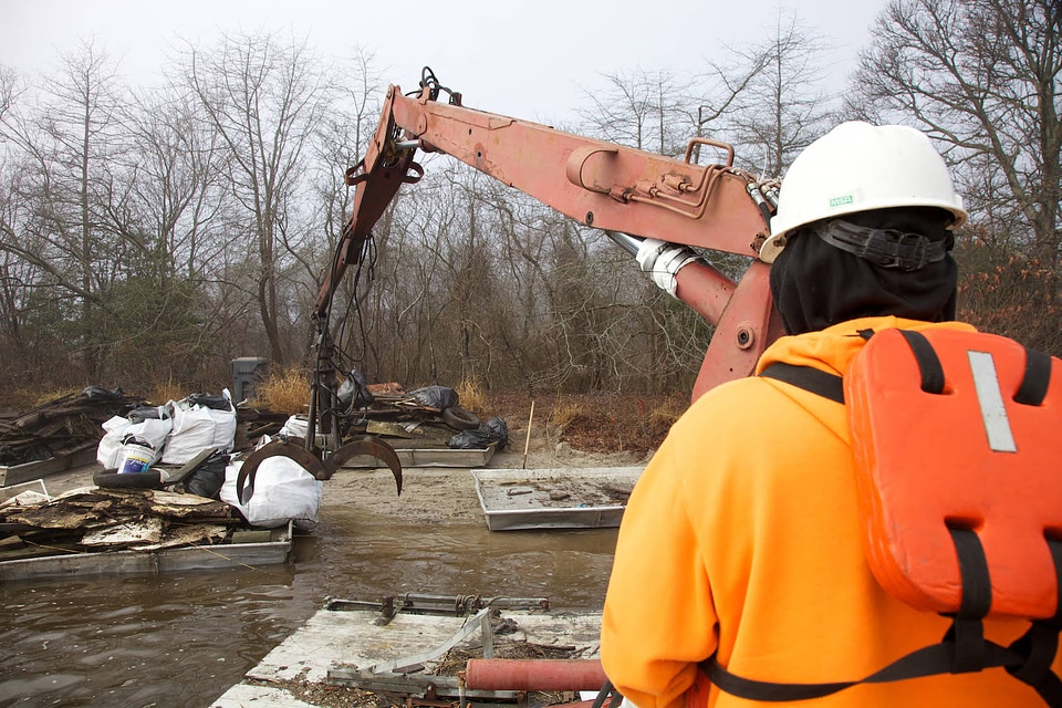 Crane removes debris from storm
