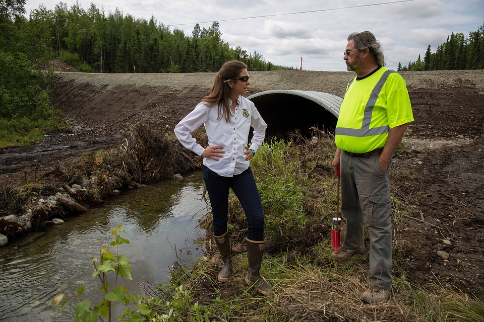 Fish passage engineer inspects new salmon friendly culvert-1