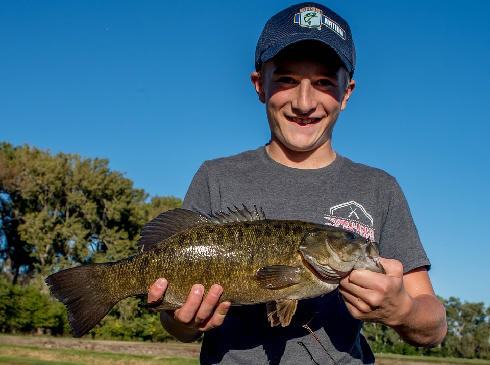 Boy with smallmouth bass-3