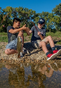 Two boys fishing for small mouth bass-1