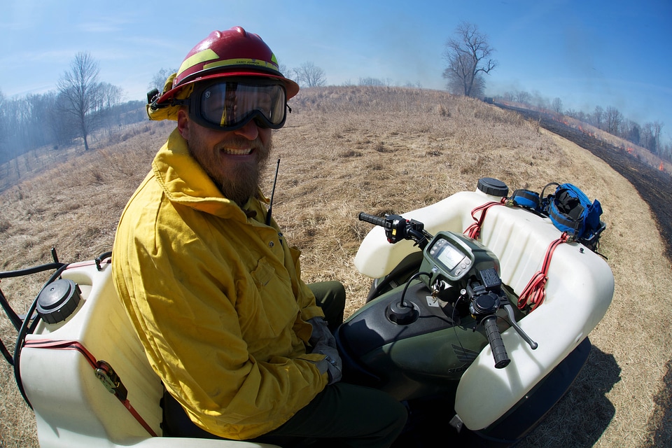 Service employee monitoring prescribed burn-1