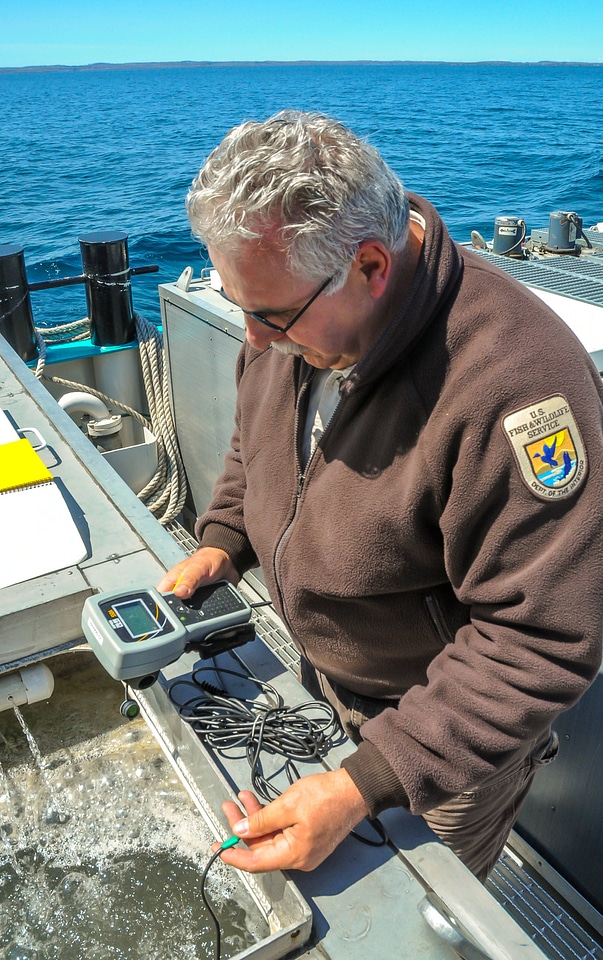 Fisheries worker aboard MV Spencer Baird-1