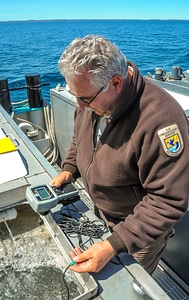 Fisheries worker aboard MV Spencer Baird-1 photo