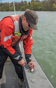 USFWS Fisheries crew baiting lines for lake sturgeon-6