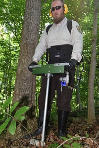 NCTC land management specialist uses motorized injector to treat ash trees-4