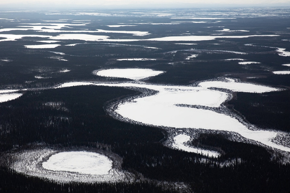 Lakes of Yukon Flats are frozen and snowy in the winter
