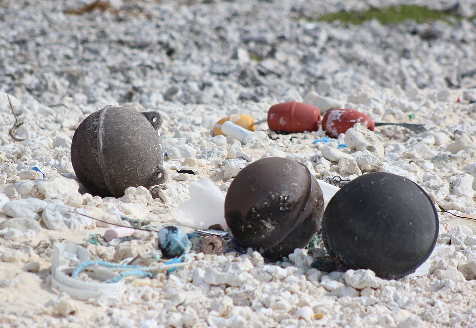 Marine debris pollutes the beach