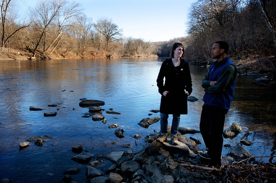 Standing on a rock by the shore of the Potomac River