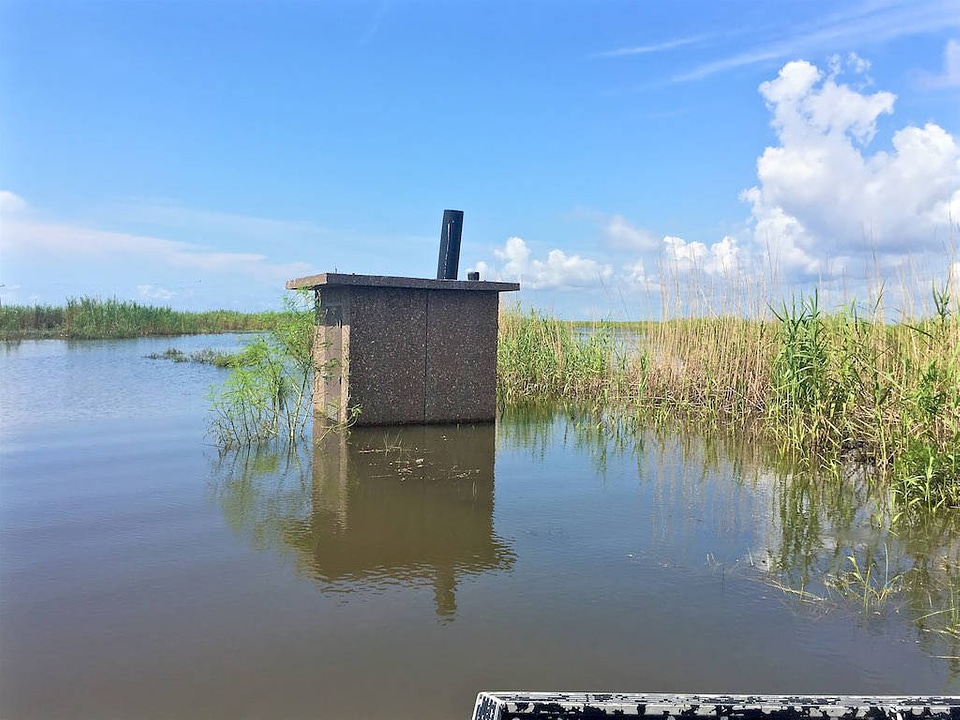 Flooded public restroom on Mcfadden NWR 