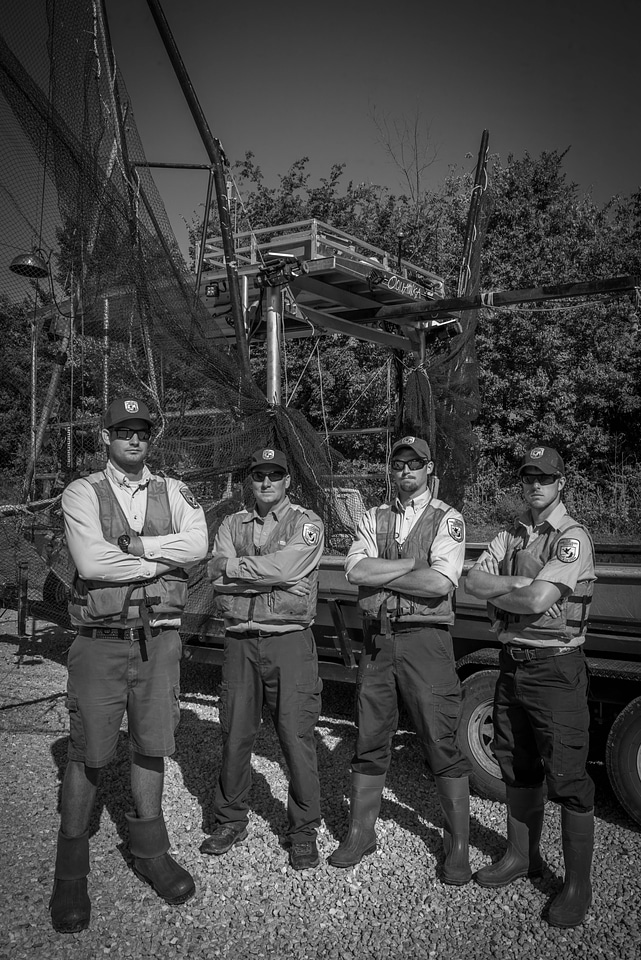 Crew of the U.S. Fish and Wildlife Service boat, The Magna Carpa-1