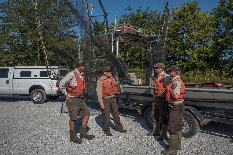 Crew of the U.S. Fish and Wildlife Service boat, The Magna Carpa, safety briefing-3
