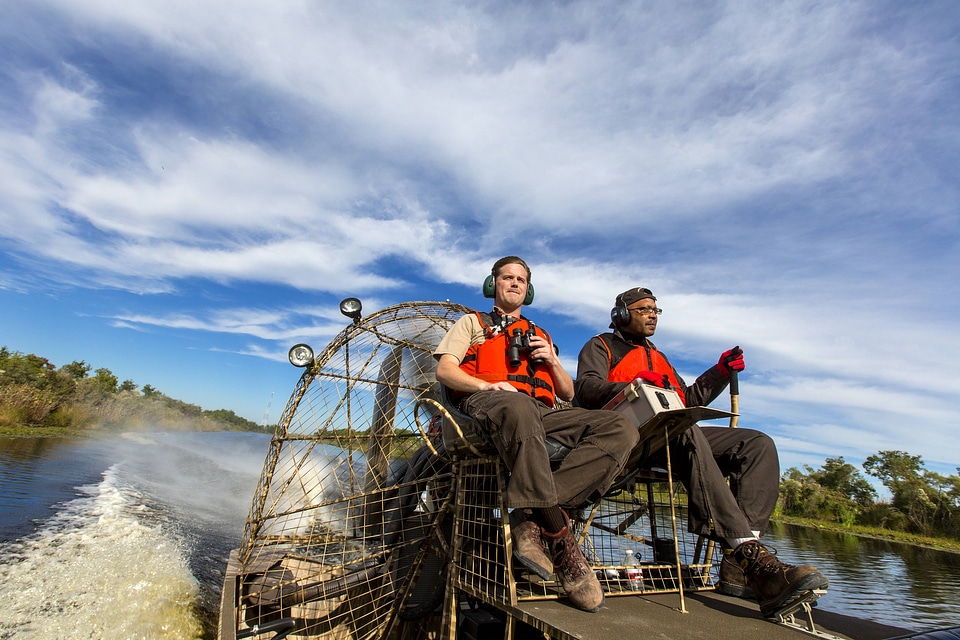 Employees operate an airboat at Bayou Sauvage NWR-2