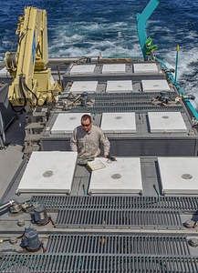 Fisheries worker aboard MV Spencer Baird-3