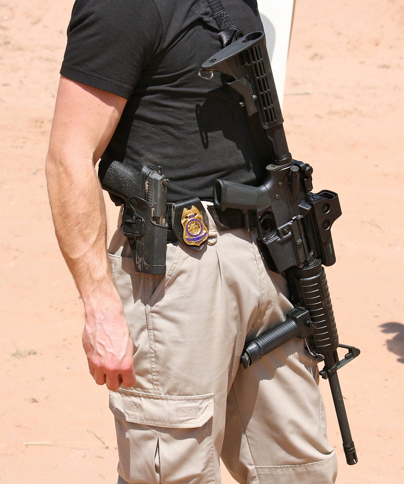 Special Agent with Sidearm, AR-15 and Badge