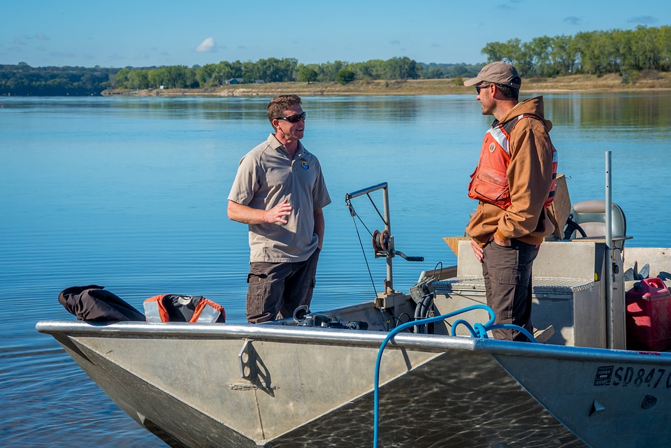 Biologist at boat on Missouri River near Yankton, South Dakota