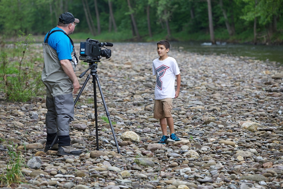 Student is interviewed during outdoor education event