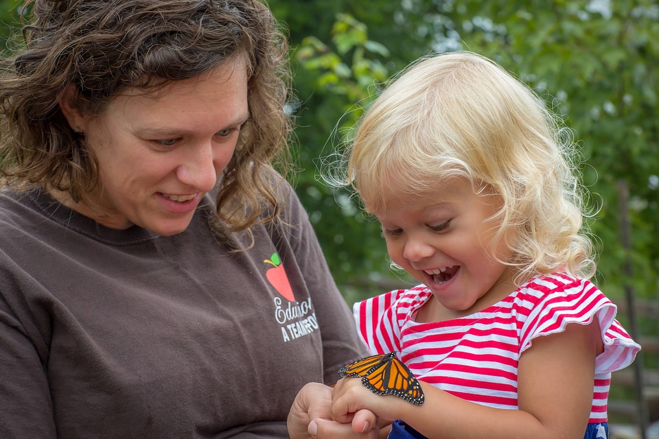 Mother and daughter with monarch butterfly-2