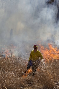 Firefighter torching field-4