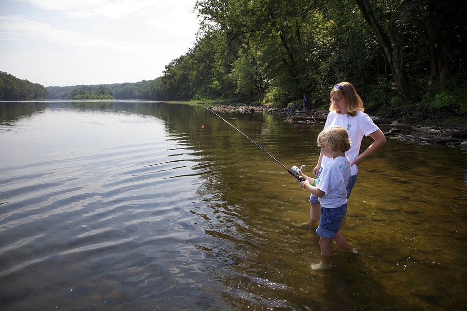 Woman and a child fishing