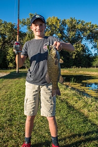 Boy with smallmouth bass-1