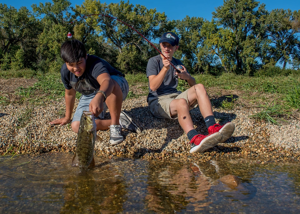 Two boys fishing for small mouth bass-1